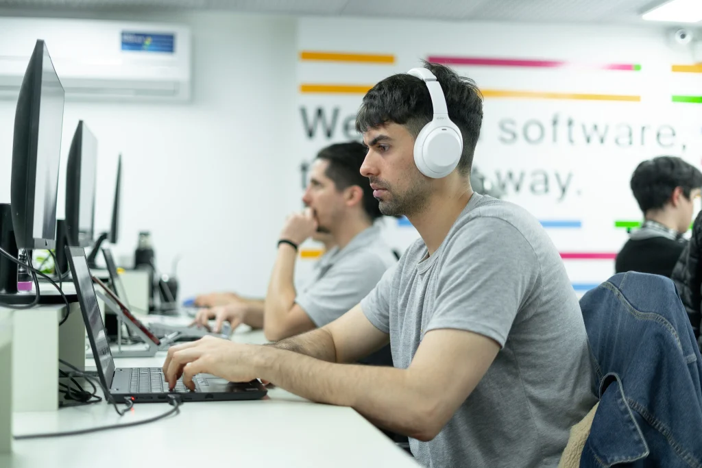 A professional photo highlighting the vibrant, positive culture among Crombie team members in a casual setting.