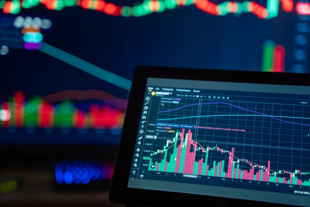 Financial data charts and market analytics displayed on a computer screen, representing data normalization, data integration, and real-time analytics.